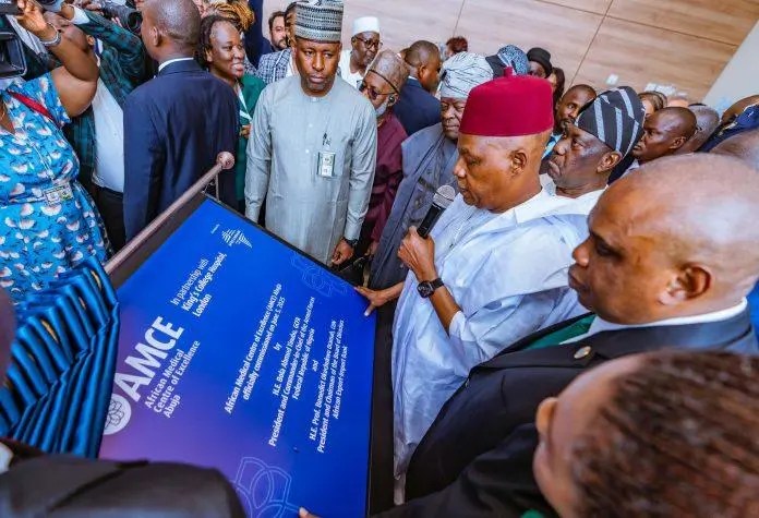 Vice President Kashim Shettima cutting the ribbon at the official opening of the African Medical Centre of Excellence, a $400 million health facility in Abuja.