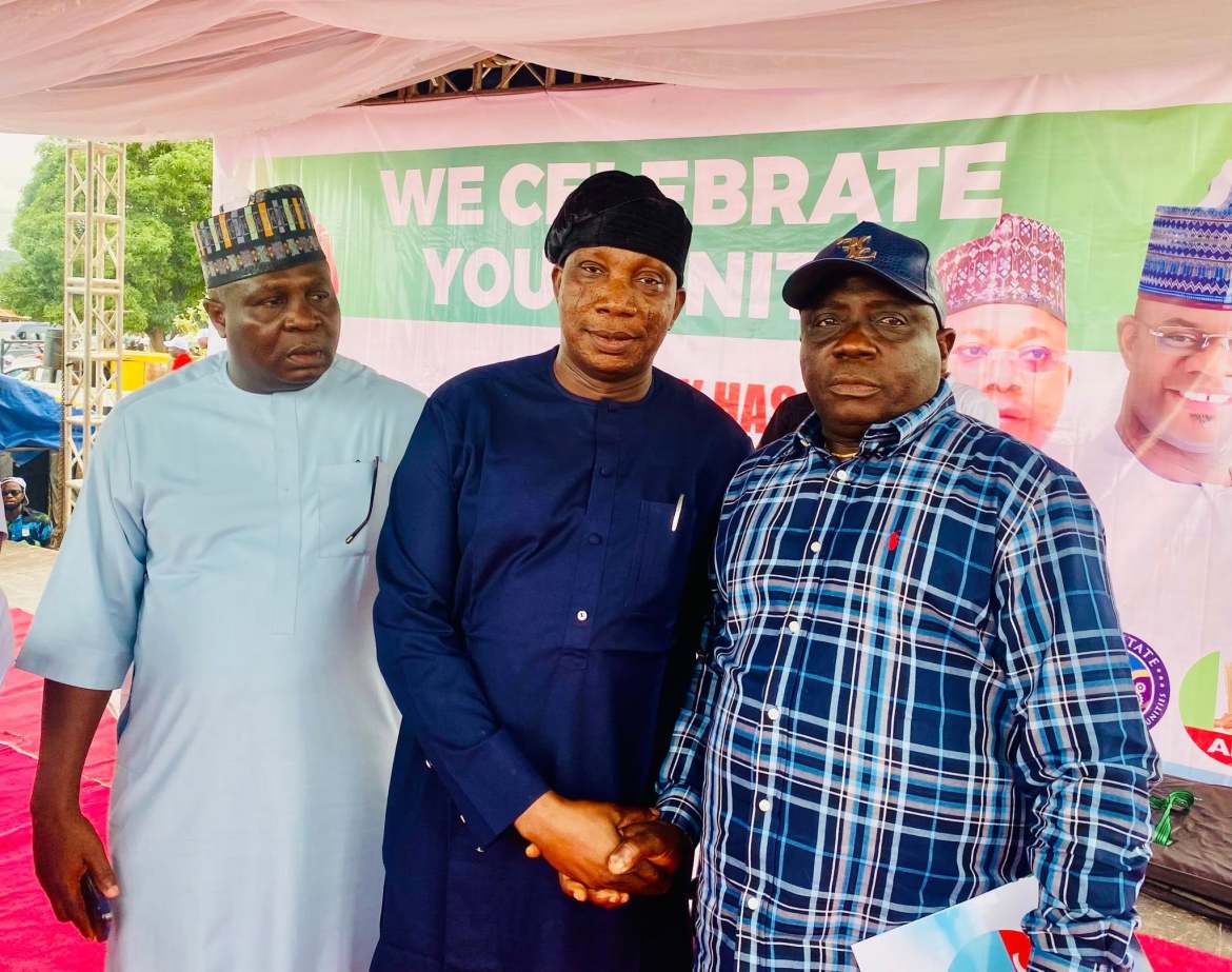 Image of Hon. David Idris Zacharias welcoming new APC members in Isanlu